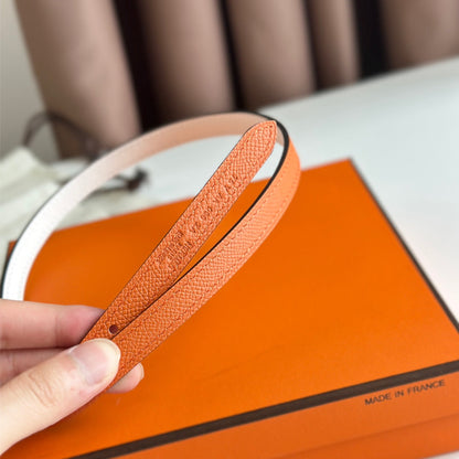 HM ROULIS BUCKLE & REVERSIBLE ORANGE AND WHITE LEATHER STRAP 13MM SILVER HARDWARE