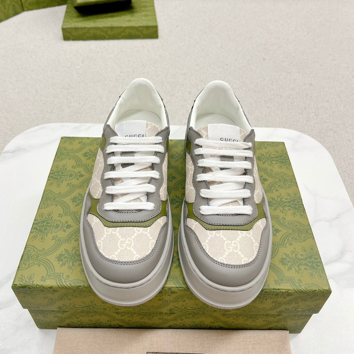 GG TRAINER GRAY AND CREAMY WHITE CALFSKIN