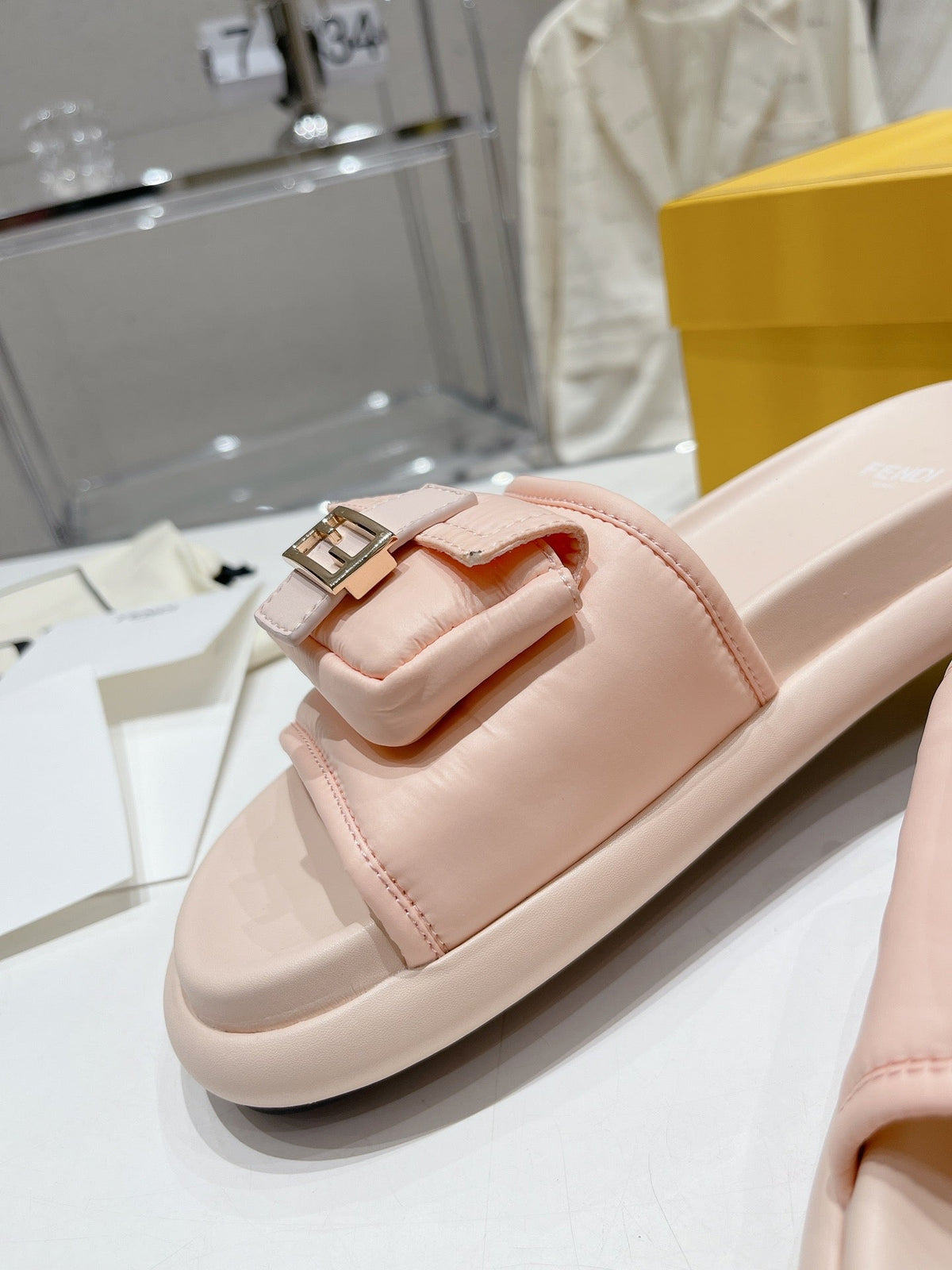 FENDI BAGUETTE SLIPPERS IN PASTEL PINK LAMBSKIN WITH GOLD HARDWARE