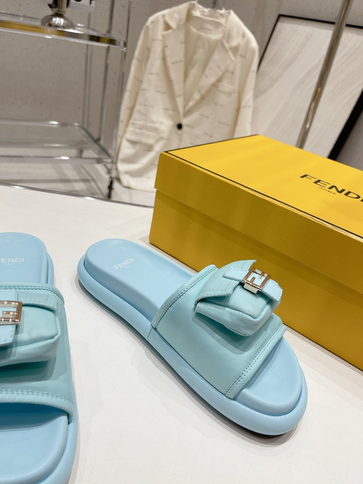 FENDI BAGUETTE SLIPPERS IN SKY BLUE LAMBSKIN WITH GOLD HARDWARE