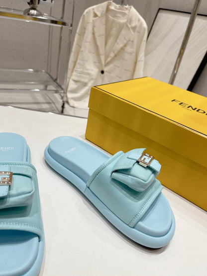 FENDI BAGUETTE SLIPPERS IN SKY BLUE LAMBSKIN WITH GOLD HARDWARE