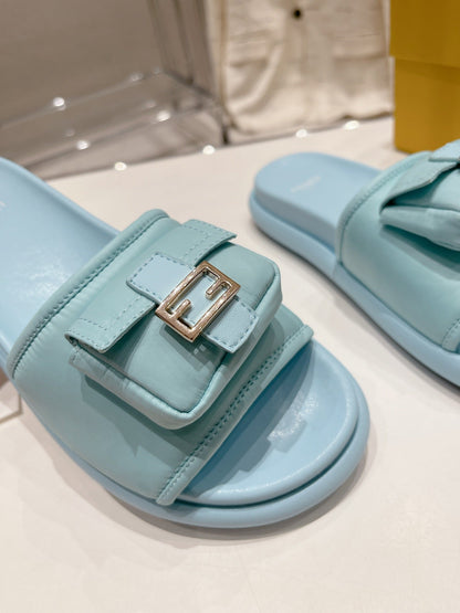 FENDI BAGUETTE SLIPPERS IN SKY BLUE LAMBSKIN WITH GOLD HARDWARE