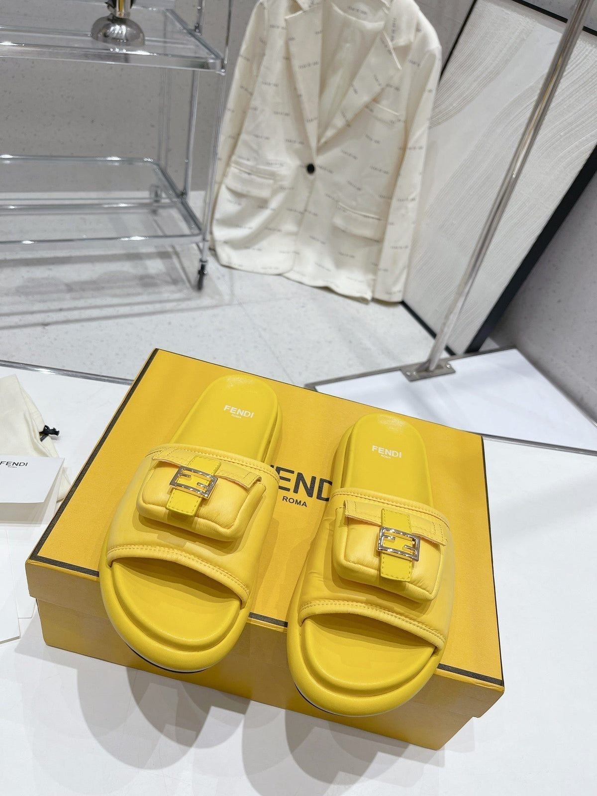 FENDI BAGUETTE SLIPPERS IN NAPLES YELLOW LAMBSKIN WITH GOLD HARDWARE