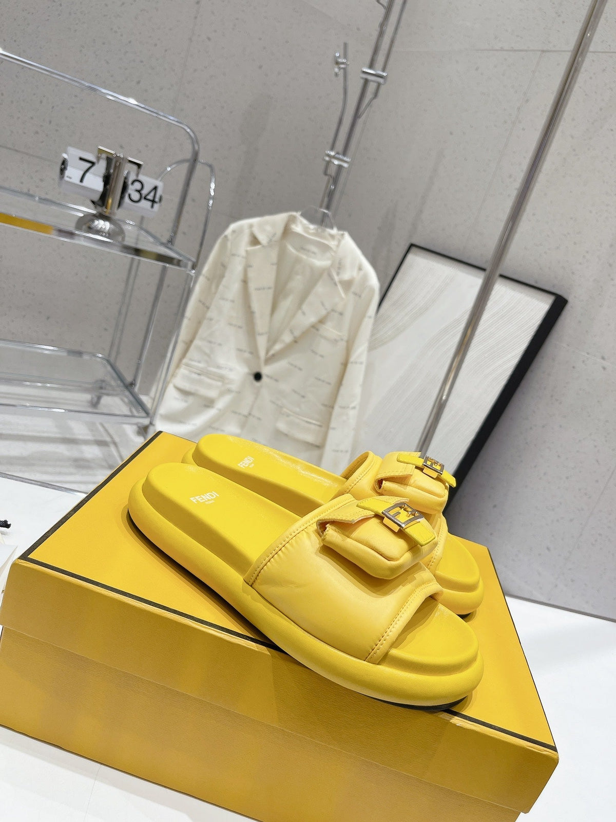 FENDI BAGUETTE SLIPPERS IN NAPLES YELLOW LAMBSKIN WITH GOLD HARDWARE