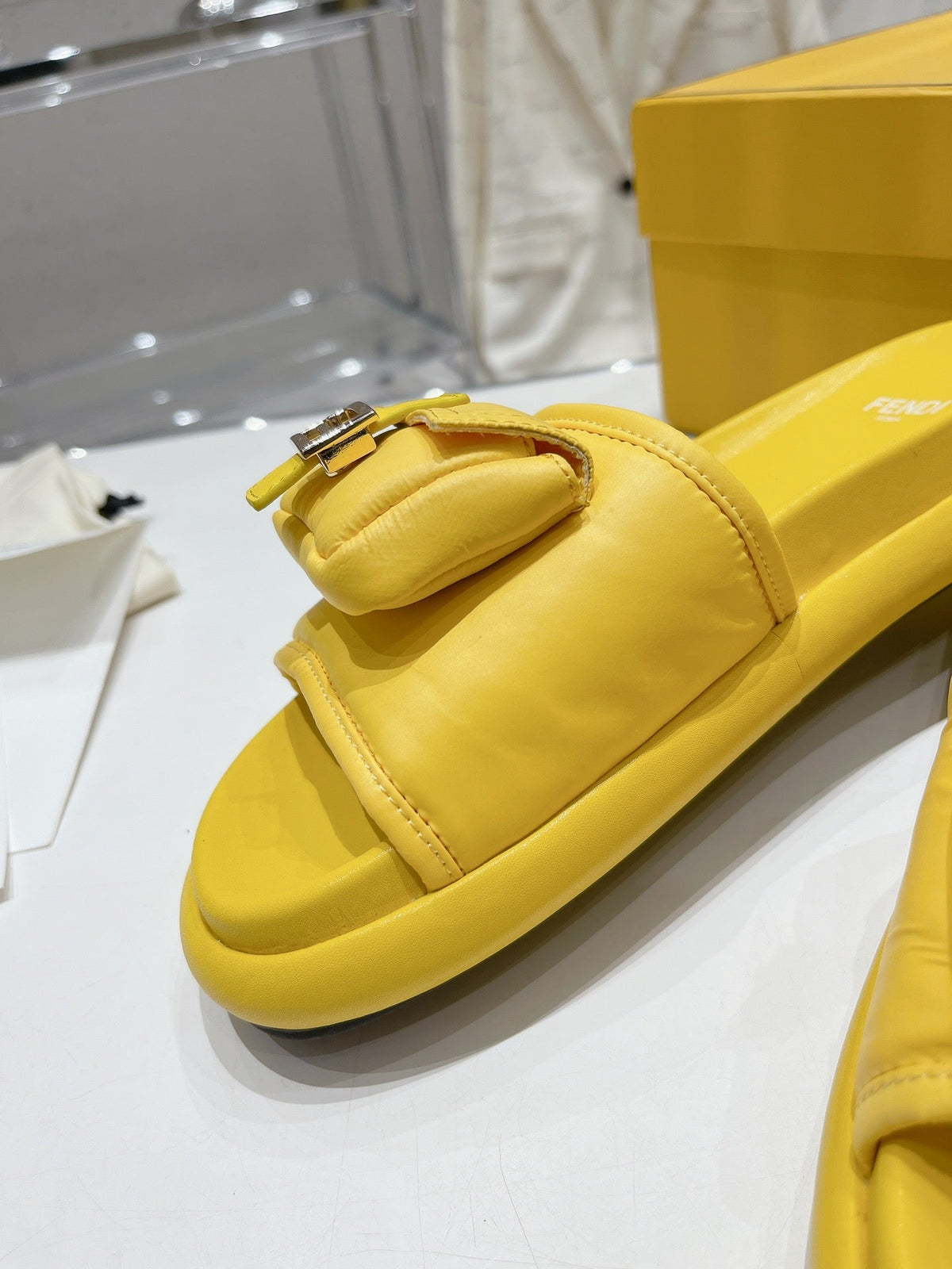 FENDI BAGUETTE SLIPPERS IN NAPLES YELLOW LAMBSKIN WITH GOLD HARDWARE