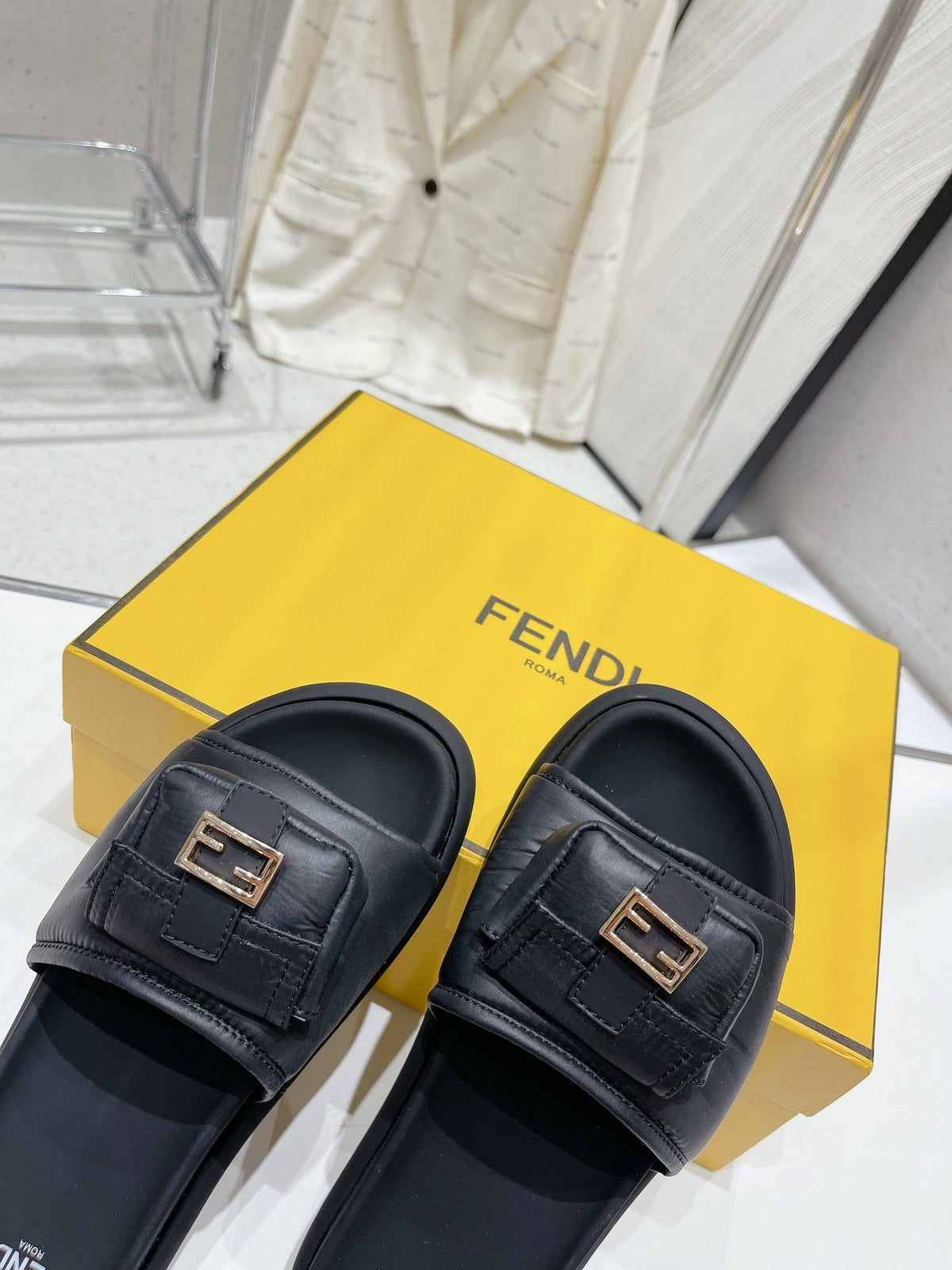 FENDI BAGUETTE SLIPPERS IN BLACK LAMBSKIN WITH GOLD HARDWARE