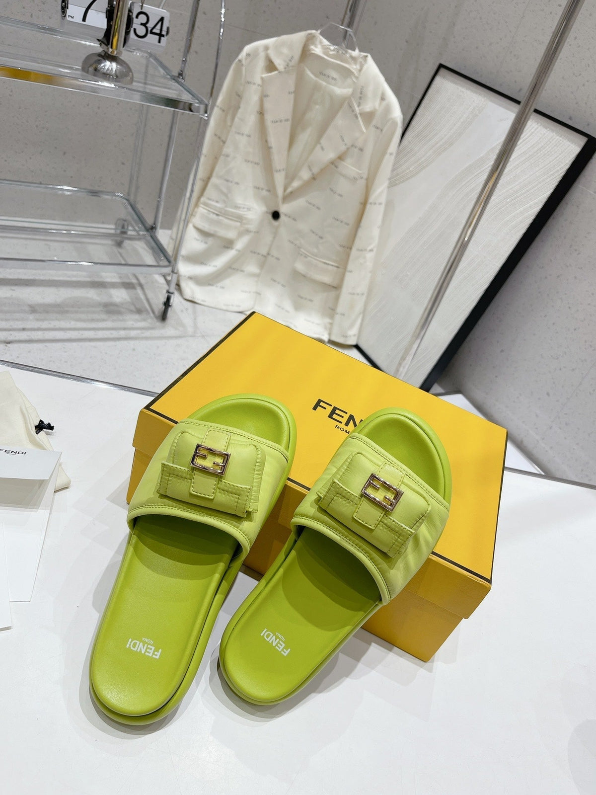 FENDI BAGUETTE SLIPPERS IN PEAR GREEN LAMBSKIN WITH GOLD HARDWARE