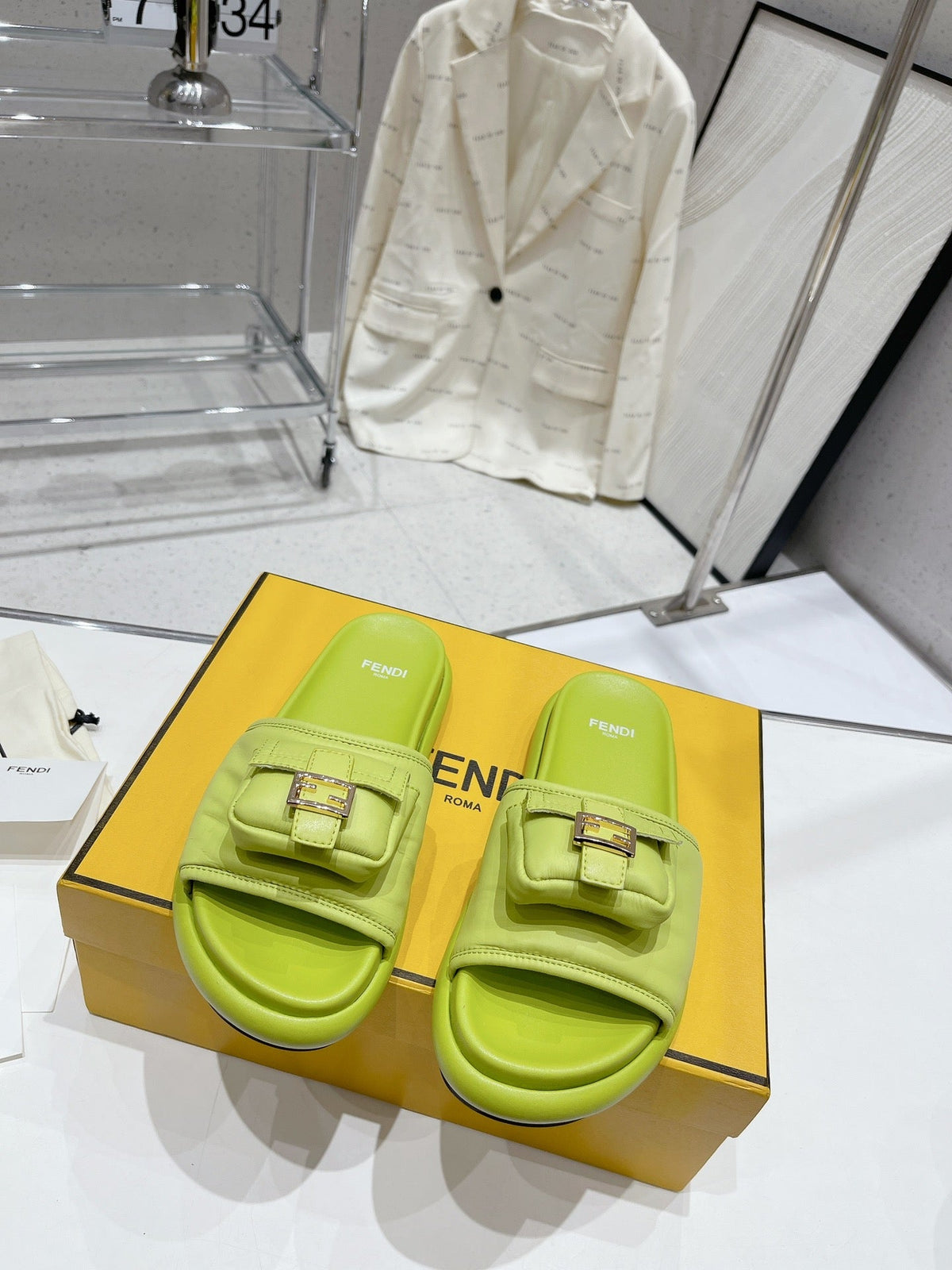 FENDI BAGUETTE SLIPPERS IN PEAR GREEN LAMBSKIN WITH GOLD HARDWARE