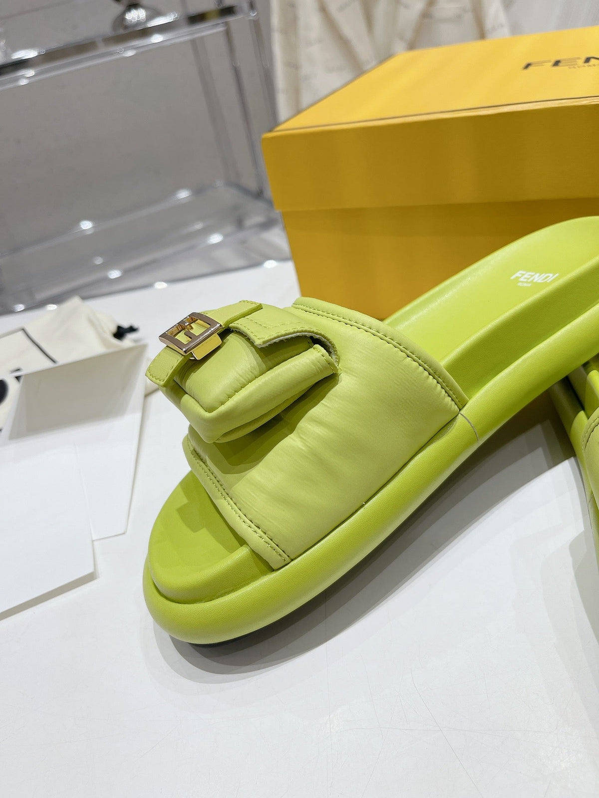 FENDI BAGUETTE SLIPPERS IN PEAR GREEN LAMBSKIN WITH GOLD HARDWARE