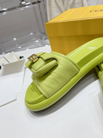FENDI BAGUETTE SLIPPERS IN PEAR GREEN LAMBSKIN WITH GOLD HARDWARE