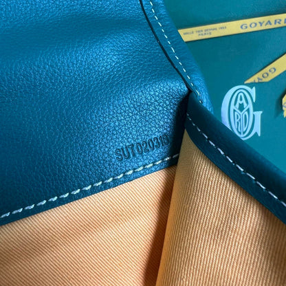 SAINT LÉGER BACKPACK 35 IN GREEN GOYARDINE CANVAS AND CALFSKIN WITH CARTOON PATCH