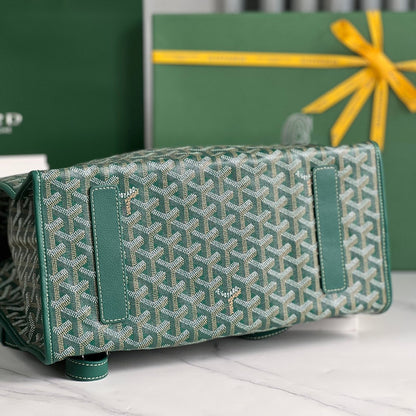 SAINT LÉGER BACKPACK 35 IN GREEN GOYARDINE CANVAS AND CALFSKIN WITH CARTOON PATCH