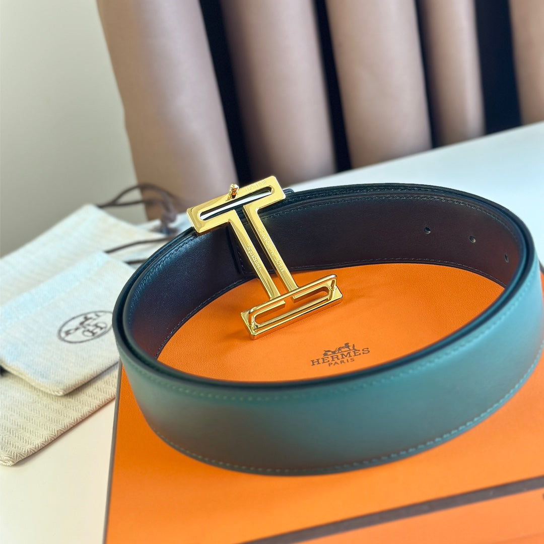 HM  BELT BUCKLE & REVERSIBLE TEAL GREEN AND BLACK LEATHER STRAP 38MM GOLD HARDWARE