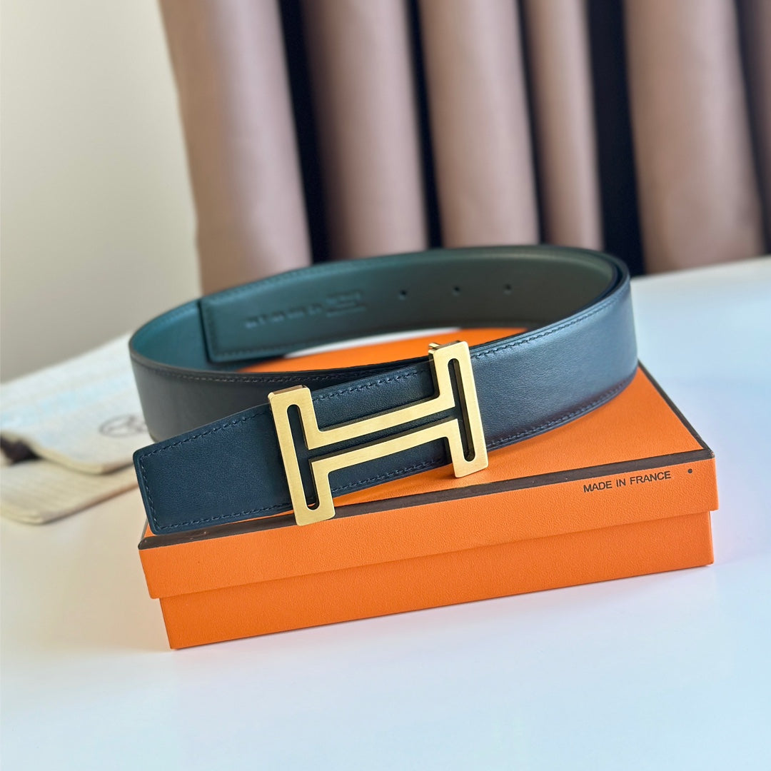 HM  BELT BUCKLE & REVERSIBLE TEAL GREEN AND BLACK LEATHER STRAP 38MM GOLD HARDWARE
