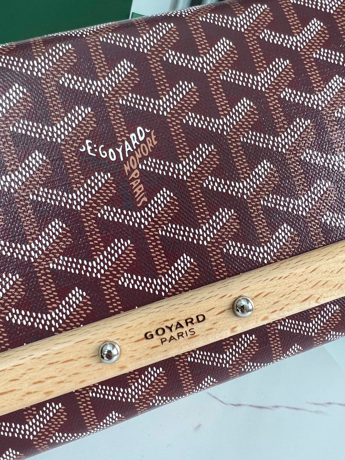 MONTE-CARLO PM CLUTCH 25 IN WINE RED GOYARDINE CANVAS