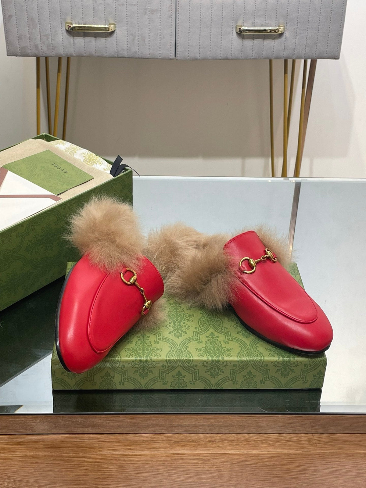 HORSEBIT MULE IN CHERRY RED CALFSKIN AND LAMB WOOL LINING