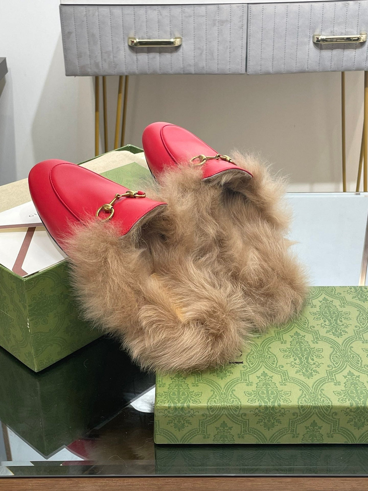 HORSEBIT MULE IN CHERRY RED CALFSKIN AND LAMB WOOL LINING
