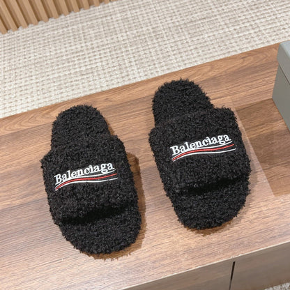 FURRY SLIDES IN BLACK CURLY SHEARLING