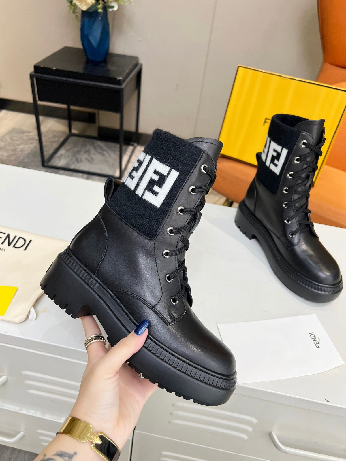 FENDI MARTIN BOOTS IN BLACK CALFSKIN AND FUR