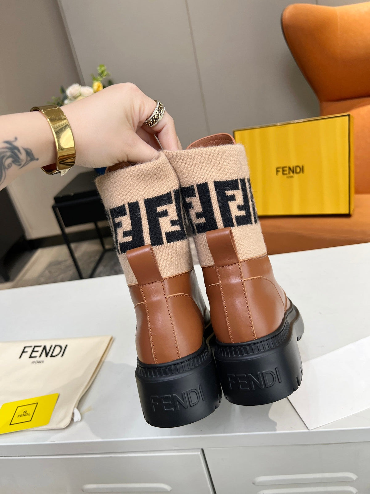 FENDI MARTIN BOOTS IN BRONZE BROWN CALFSKIN AND FUR