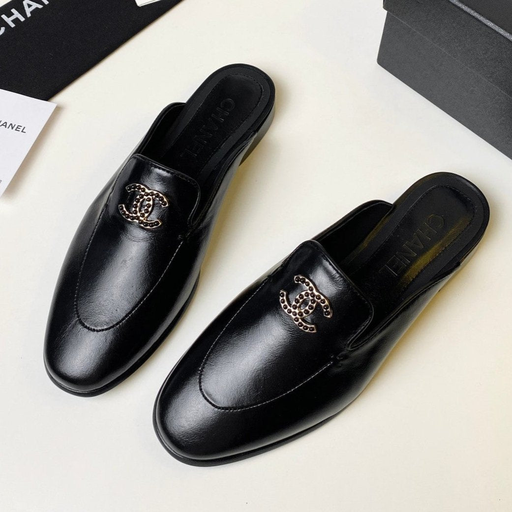 FLAT MULE IN BLACK LAMBSKIN 983818