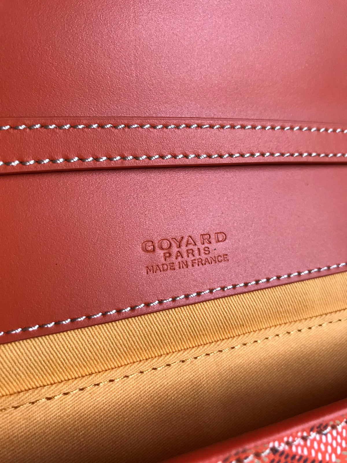MONTE-CARLO PM CLUTCH 25 IN ORANGE GOYARDINE CANVAS