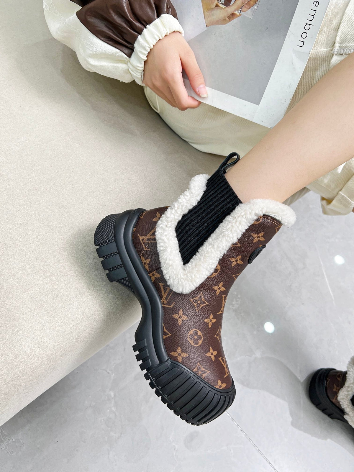 LV RUBY FLAT ANKLE BOOT IN CHOCOLATE BROWN MONOGRAM CALFSKIN AND WHITE SHEARLING