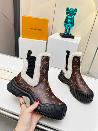 LV RUBY FLAT ANKLE BOOT IN CHOCOLATE BROWN MONOGRAM CALFSKIN AND WHITE SHEARLING