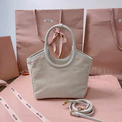 IVY HANDBAG 22 IN WHITE CANVAS