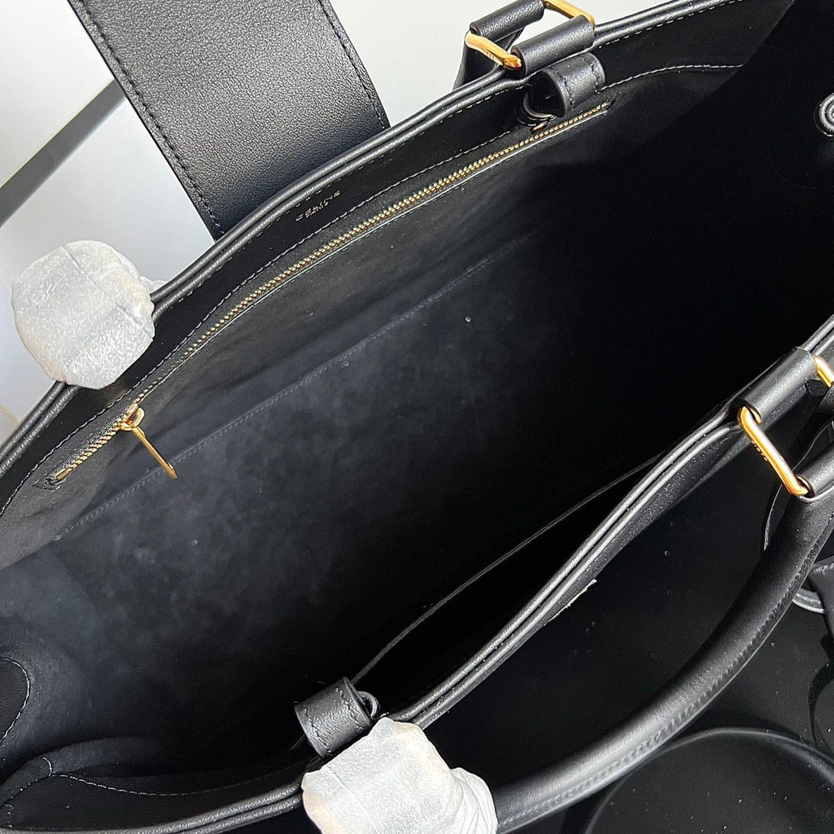 TRIOMPHE 37 BLACK SOFT CALFSKIN HANDBAG