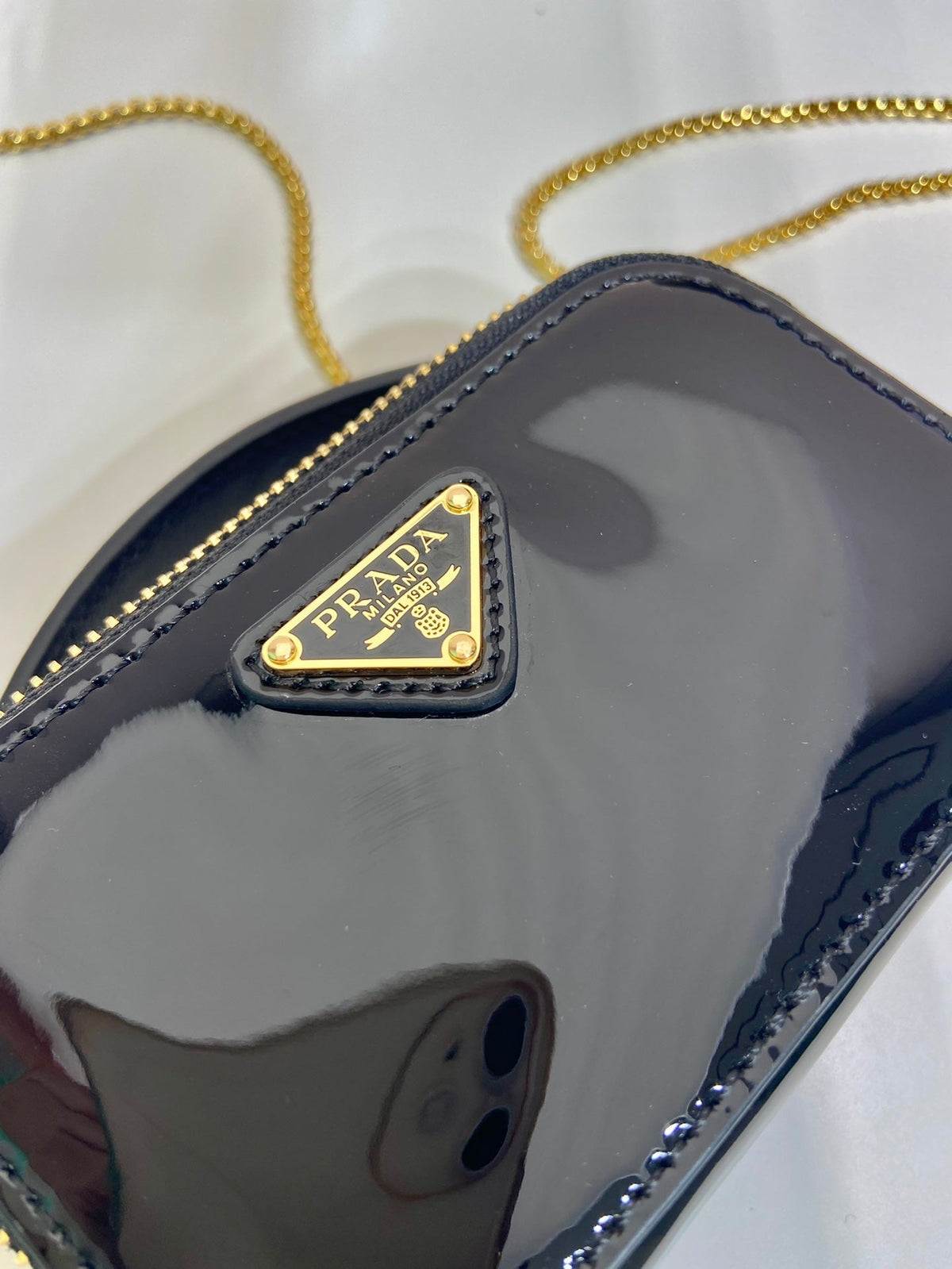 MINI HAND BAG 11 WITH GOLD STRAP IN BLACK PATENT CALFSKIN