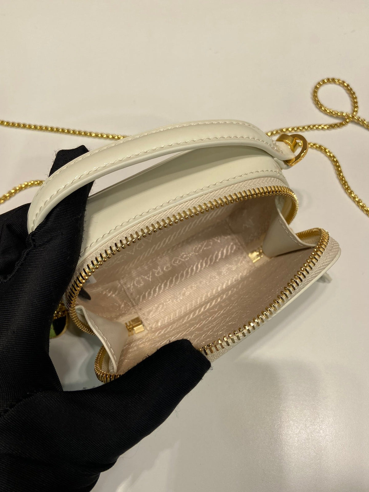 MINI HAND BAG 11 WITH GOLD STRAP IN WHITE PATENT CALFSKIN