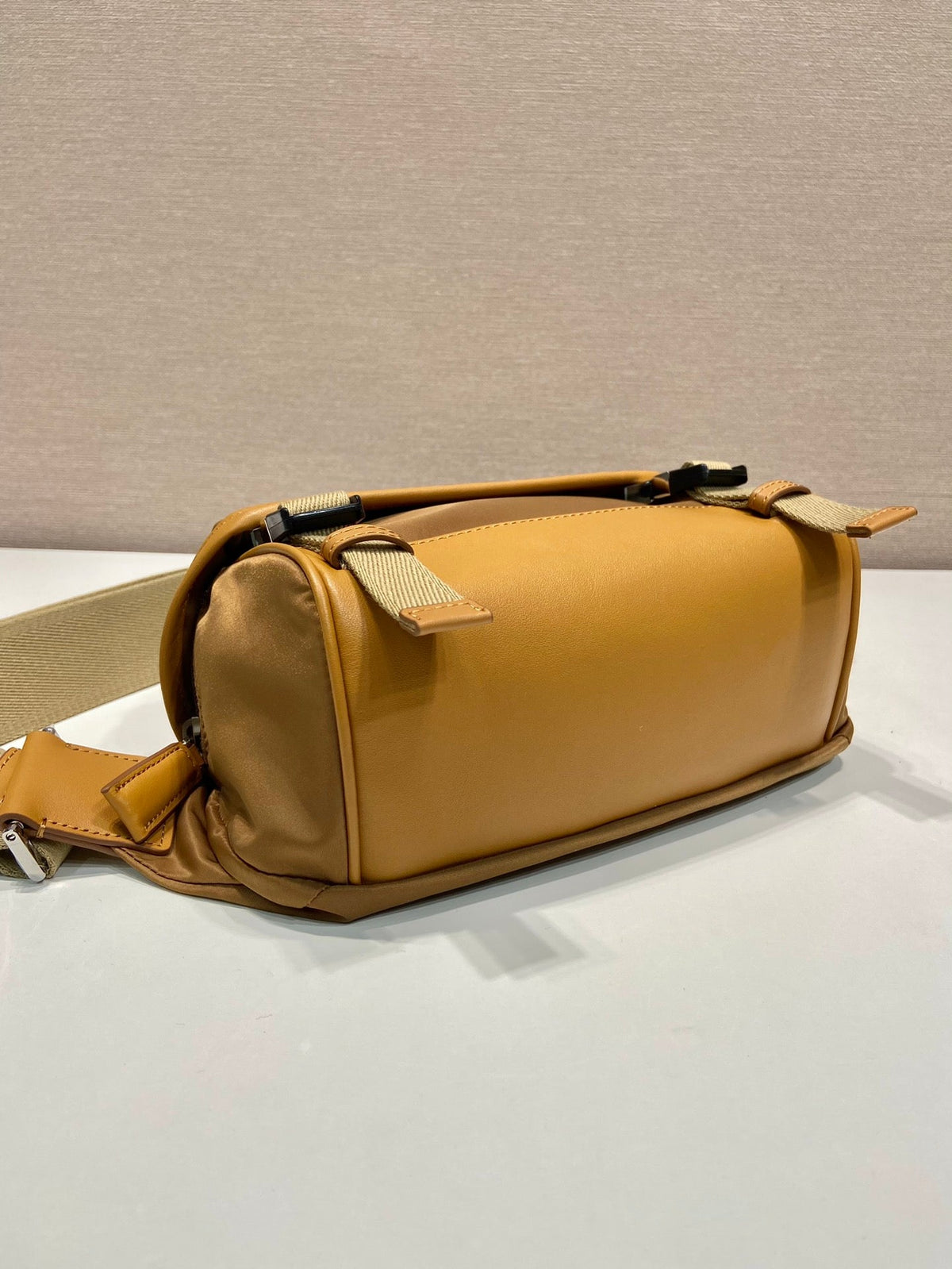 MESSENGER BAG 20 IN CIDER BROWN RE-NYLON AND CALFSKIN TRIM