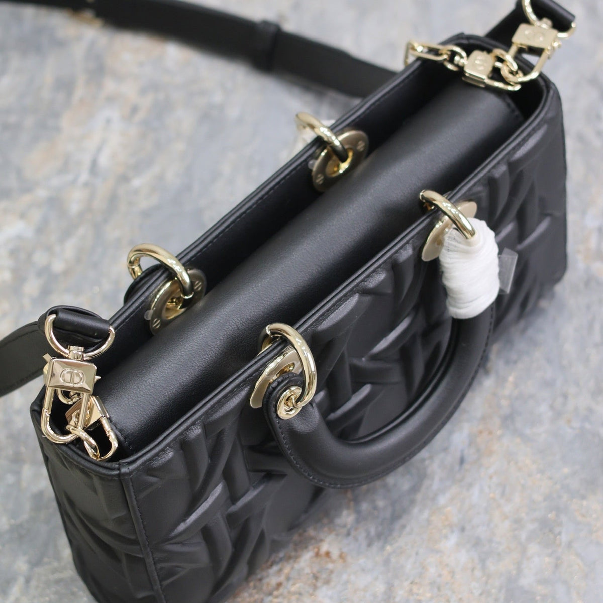 LADY D-JOY BAG 26 IN BLACK GRAPHIC CANNAGE CALFSKIN PALE GOLD-FINISH METAL CHARMS
