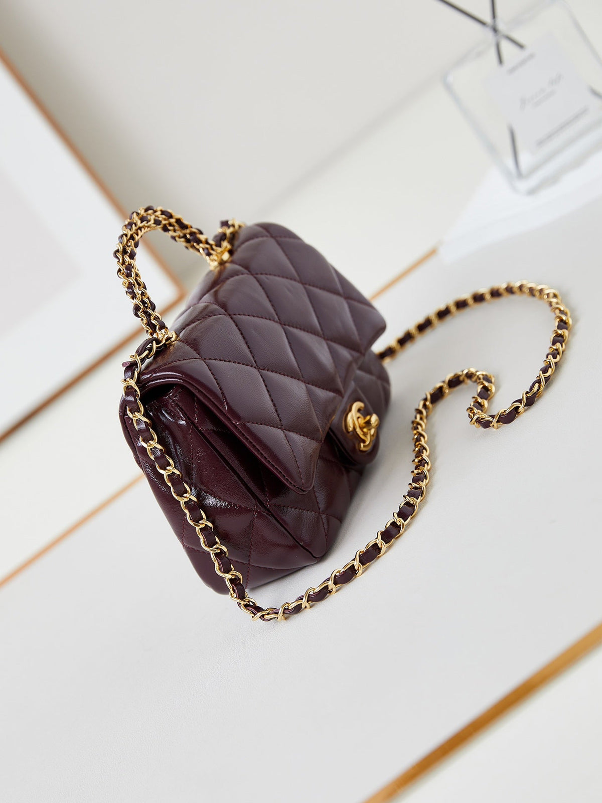 FLAP BAG WITH TOP HANDLE 19 IN WINE RED OIL-WAX LAMBSKIN GOLD HARDWARE