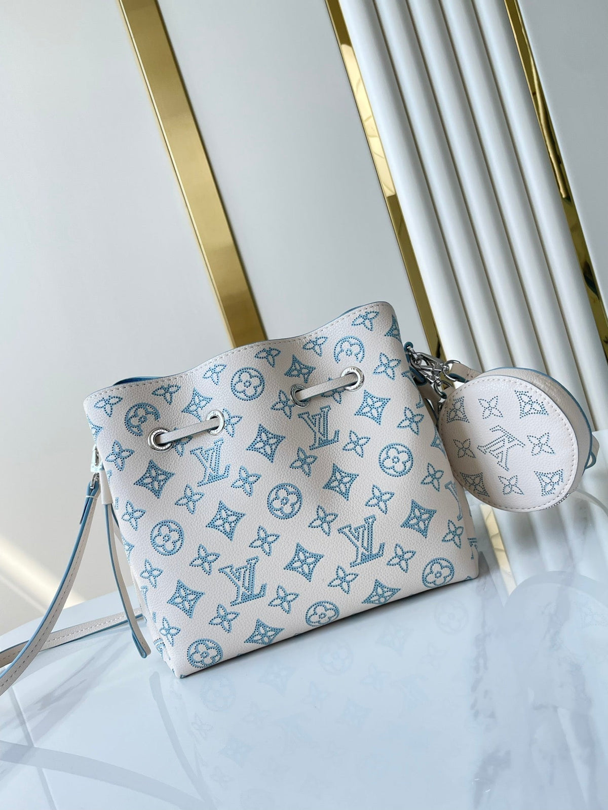 BELLA 22 IN WHITE PERFORATED CALFSKIN SILVER HARDWARE