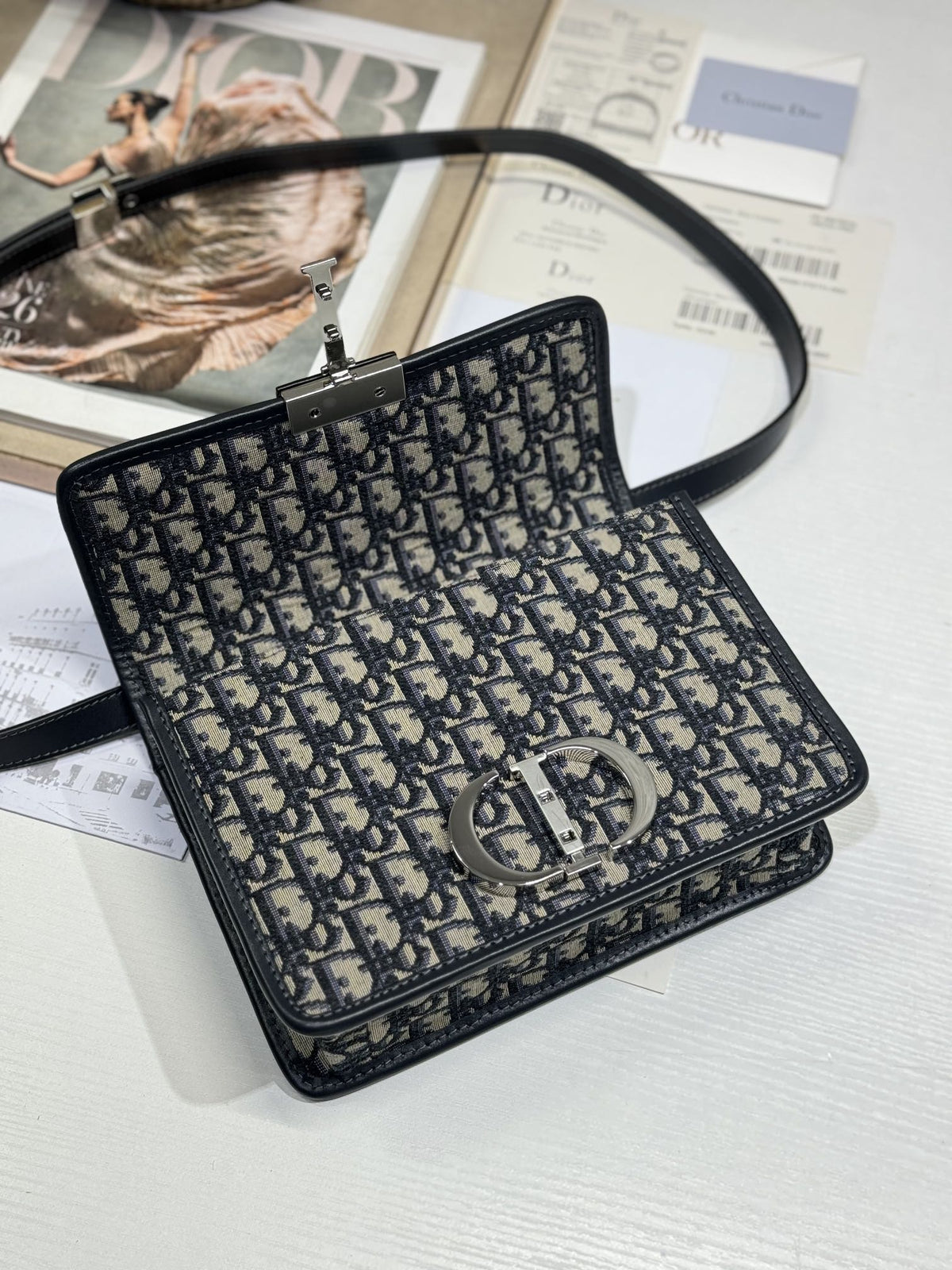 MONTAIGNE EAST-WEST BAG 24 IN BLACK LAMBSKIN AND MONOGRAM OBLIQUE JACQUARD