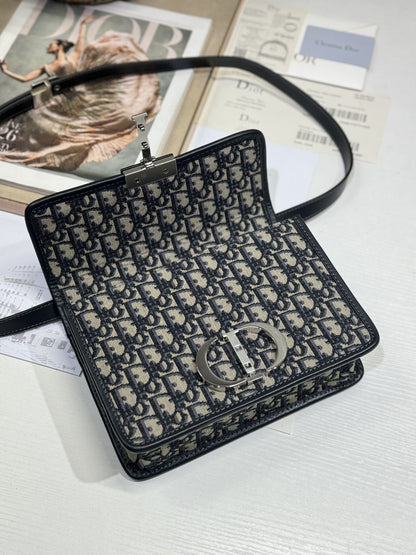 MONTAIGNE EAST-WEST BAG 24 IN BLACK LAMBSKIN AND MONOGRAM OBLIQUE JACQUARD