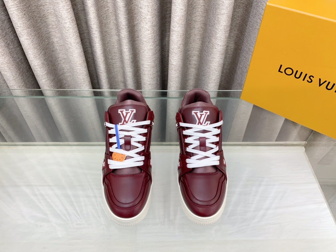 LV MAXI TRAINER IN GARNET RED CALFSKIN