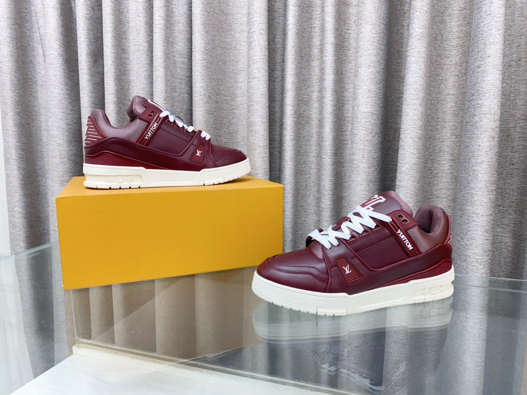 LV MAXI TRAINER IN GARNET RED CALFSKIN