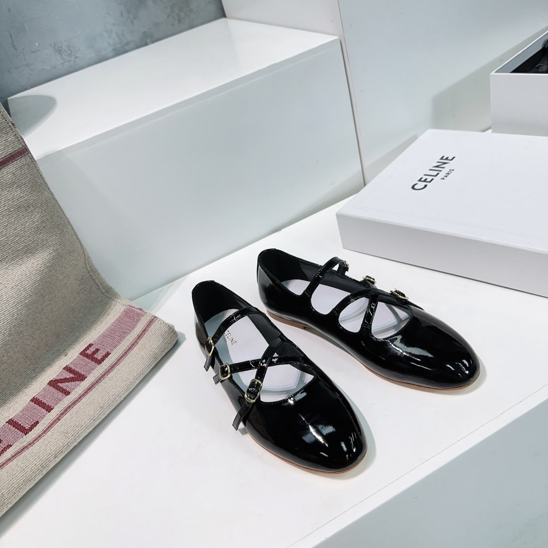 LES BALLERINES CELINE BABIES IN BLACK PATENT CALFSKIN