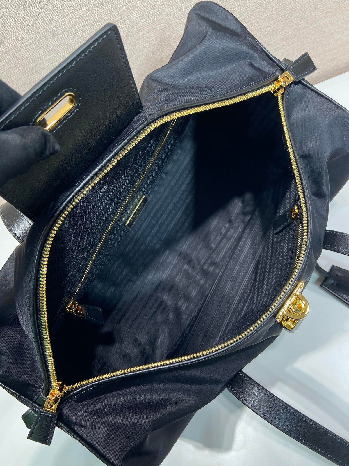 TRAVEL BAG 40 IN BLACK WATERPROOF FABRIC GOLD PADLOCK