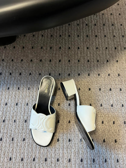 CLEMENCE MULE IN WHITE LAMBSKIN AND PATENT CALFSKIN