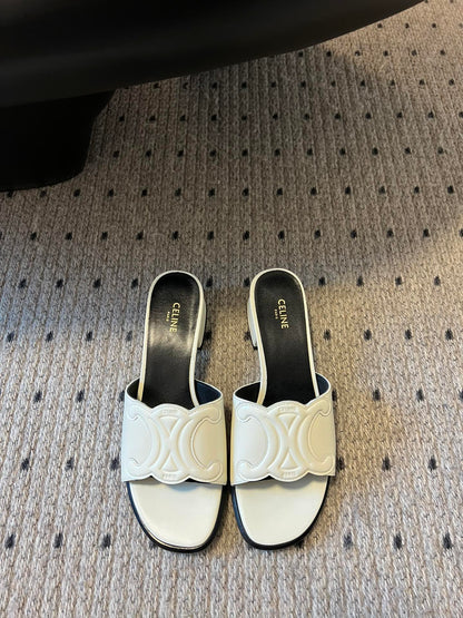 CLEMENCE MULE IN WHITE LAMBSKIN AND PATENT CALFSKIN