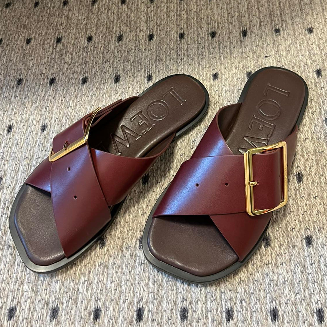 PETAL BELT FLAT SANDAL IN SANGRIA RED CALFSKIN