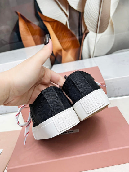 WASHED-DENIM SNEAKERS IN BLACK CANVAS WITH BROWN AND STRIPED LACES