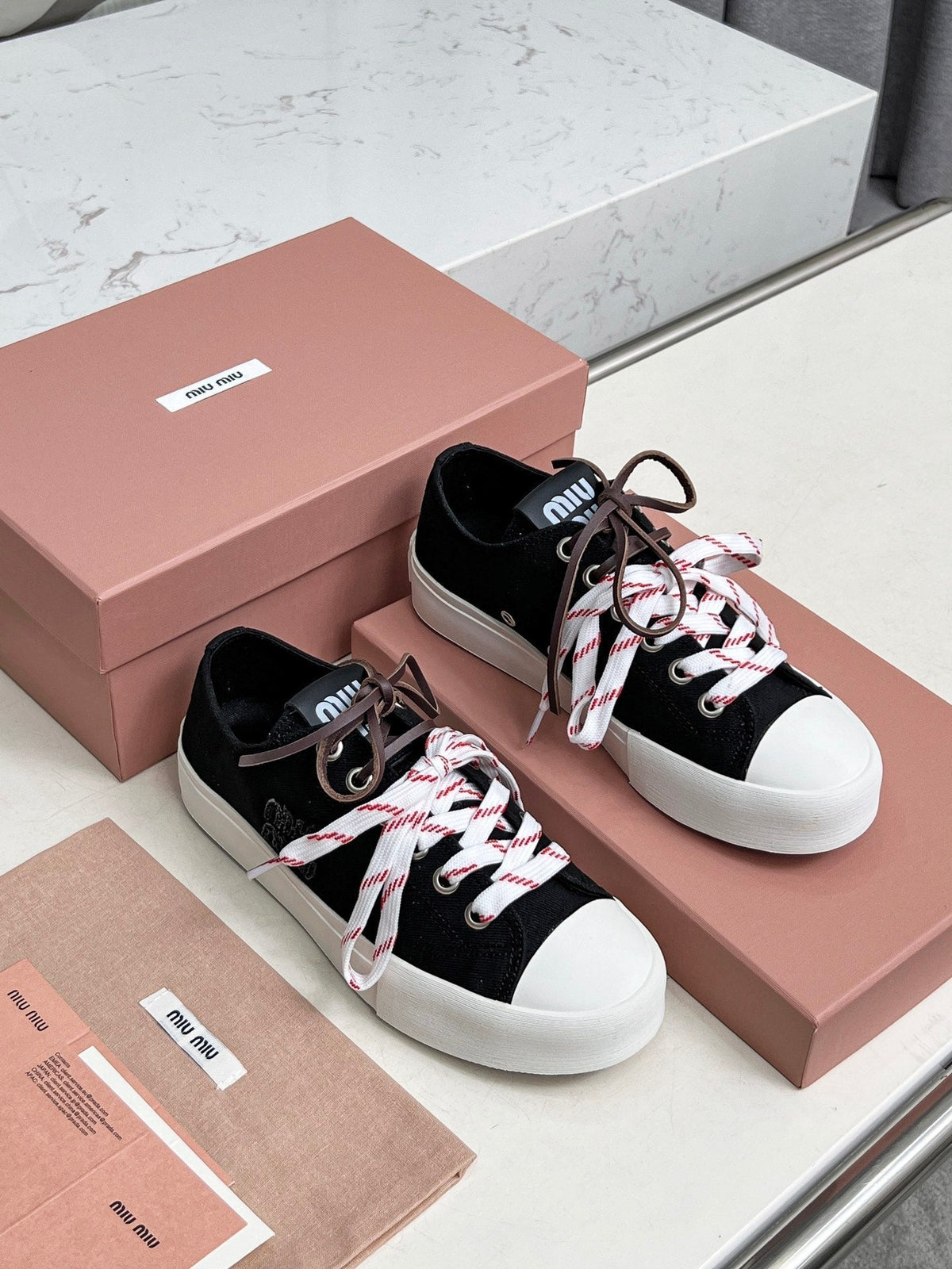 WASHED-DENIM SNEAKERS IN BLACK CANVAS WITH BROWN AND STRIPED LACES