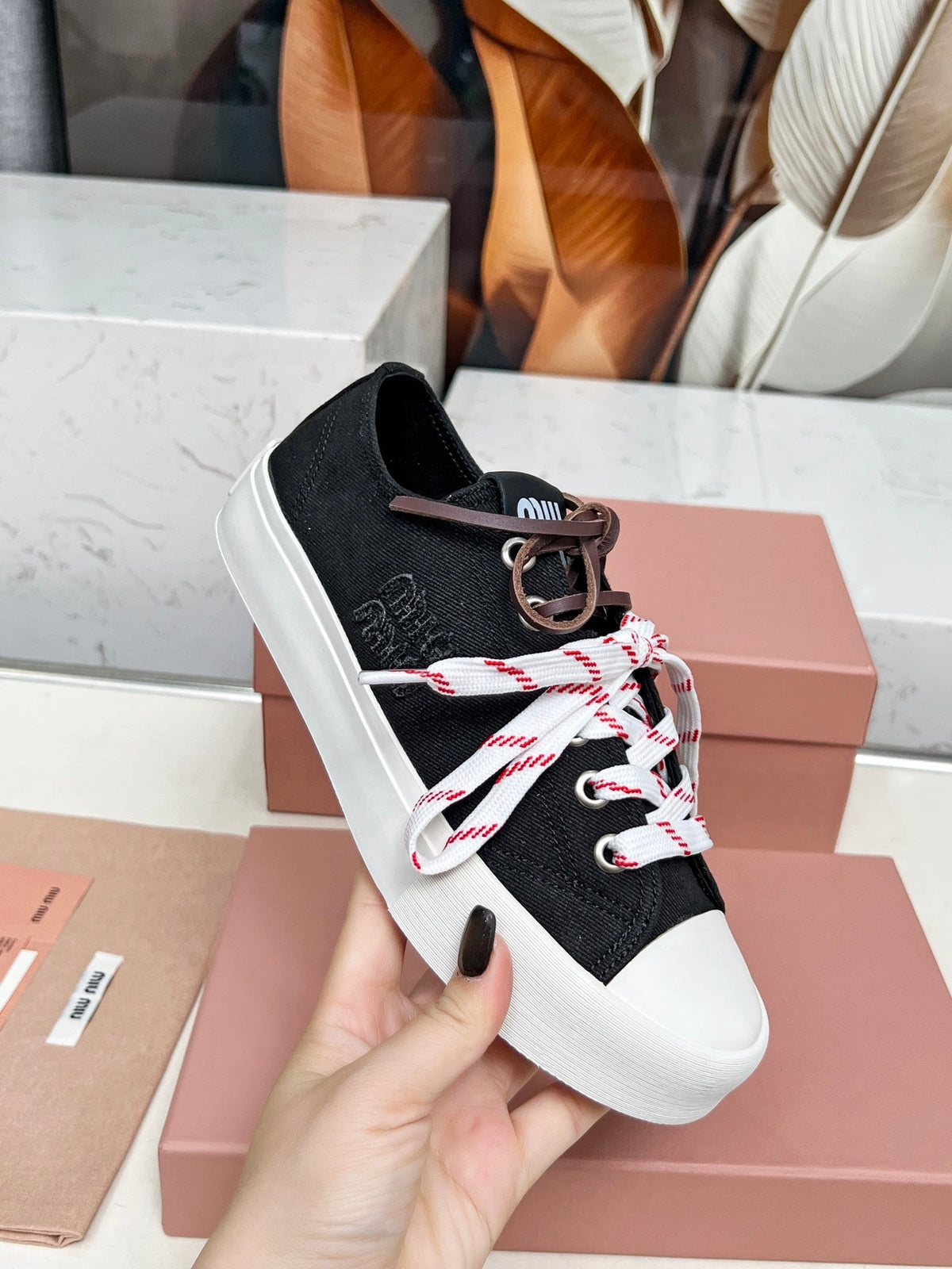 WASHED-DENIM SNEAKERS IN BLACK CANVAS WITH BROWN AND STRIPED LACES