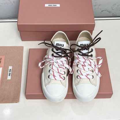 WASHED-DENIM SNEAKERS IN OFF WHITE CANVAS WITH BROWN AND STRIPED LACES