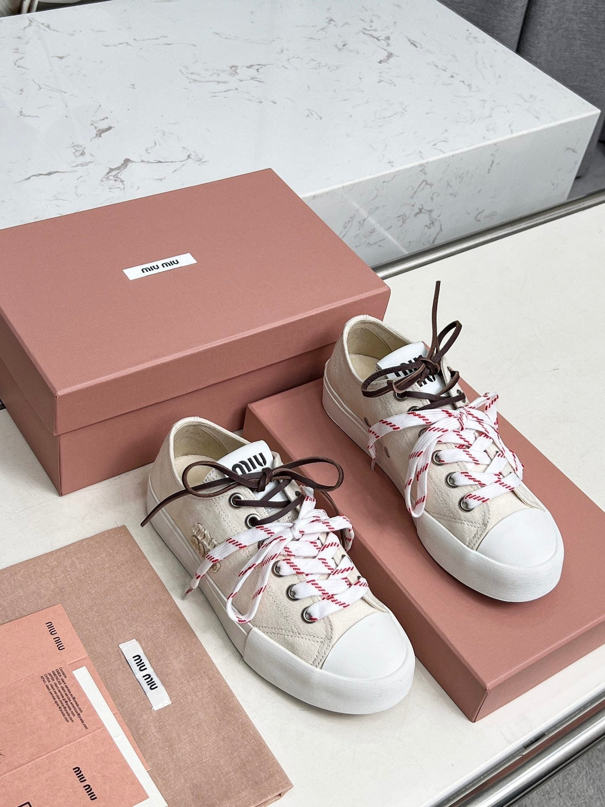 WASHED-DENIM SNEAKERS IN OFF WHITE CANVAS WITH BROWN AND STRIPED LACES